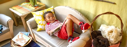 boy looking at a book