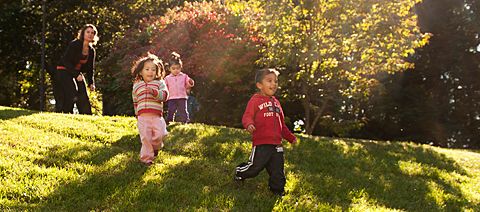 children playing on the grass