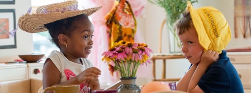 two children wearing hats