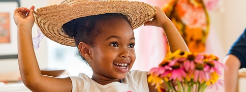 girl wearing a hat